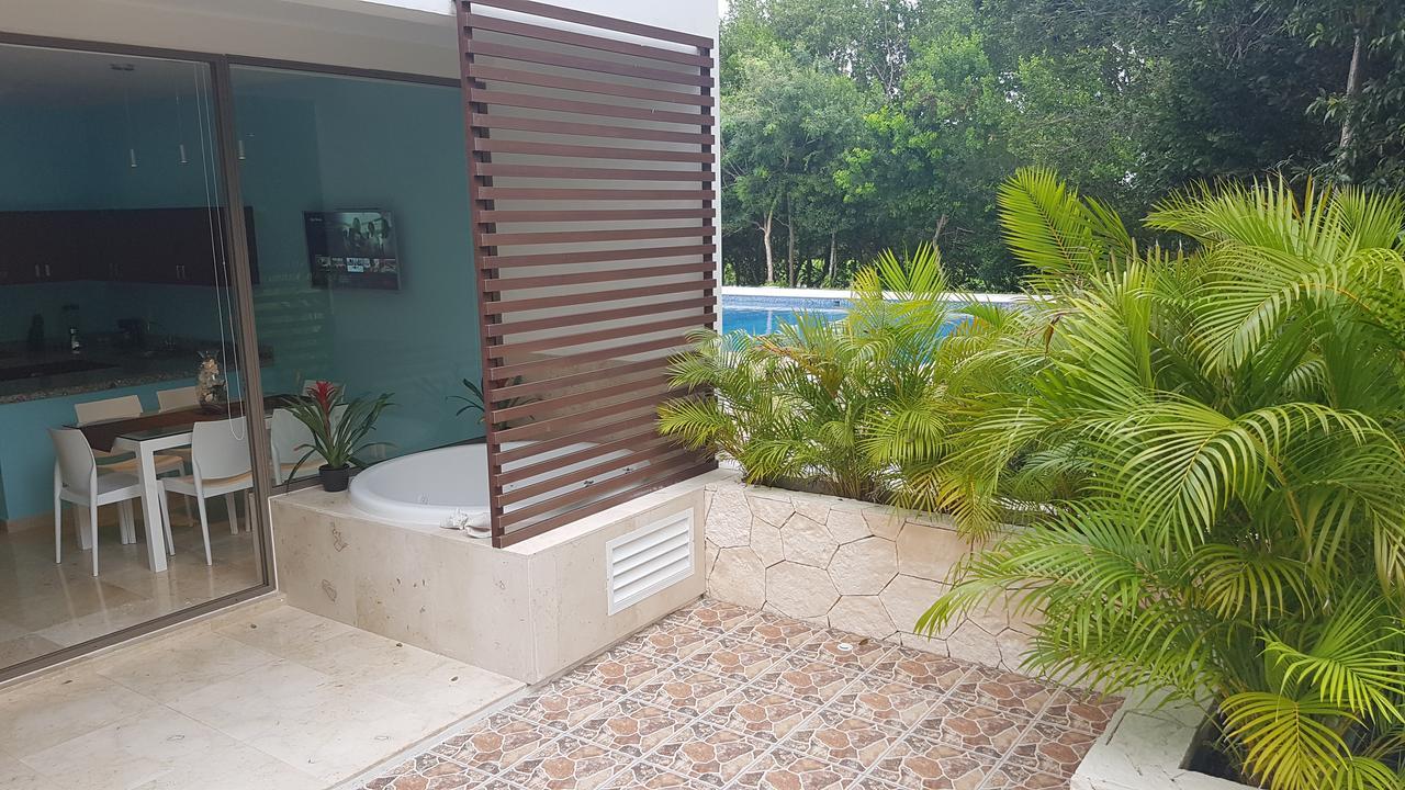 Quetzal Apartment Акумаль Экстерьер фото